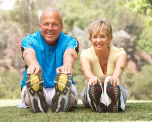 Smiling Couple Exercising