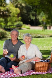 Couple with Picnic in Park
